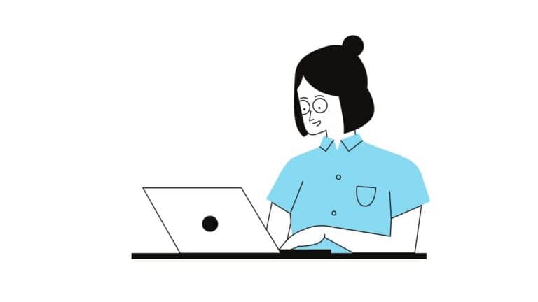 Woman studying on laptop for CAPM certification exam preparation.
